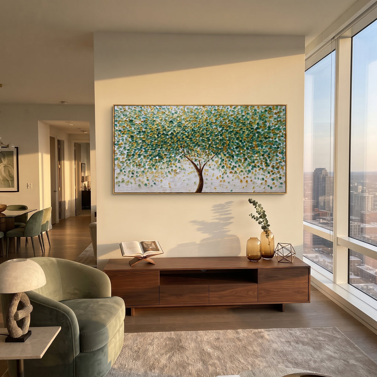 "Round Leaf Tree Painting" focuses on atmosphere, surface movement, and sculptural heavy impasto craftsmanship rather than a fixed literal storyline. The composition uses this hand-painted panoramic canvas shows a centered brown tree with hundreds of small round green and golden leaves, a bright white textured ground, and dot-like impasto marks that create a lively forest canopy effect as the visual anchor, while layered palette-knife paint, raised plaster-like texture, and softened brush