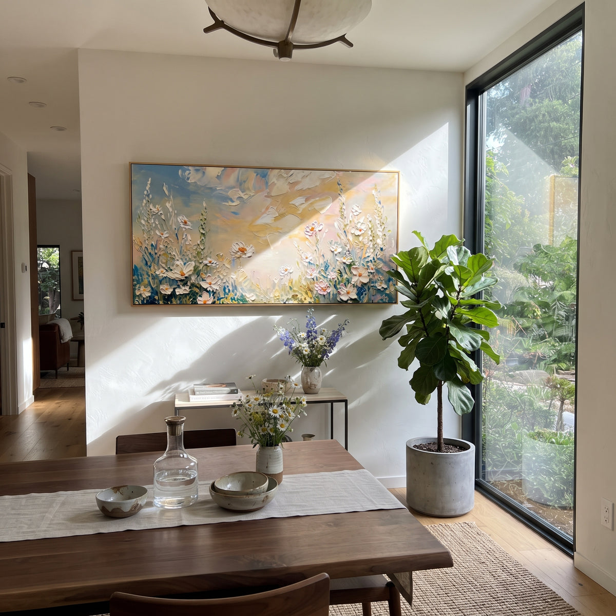 "White Daisy Meadow Painting" focuses on atmosphere, surface movement, and sculptural heavy impasto craftsmanship rather than a fixed literal storyline. The composition uses this hand-painted panoramic canvas presents white daisies and tall meadow stems along a peach and blue sky, with textured petals grouped across the lower panoramic canvas as the visual anchor, while layered palette-knife paint, raised plaster-like texture, and softened brush movement create tactile depth across the canvas.