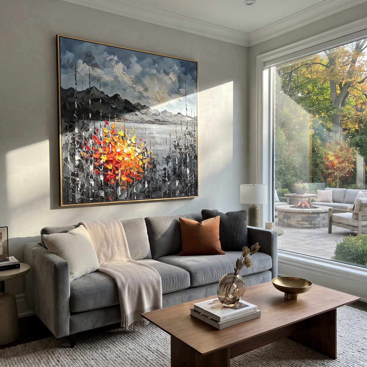 "Mountain Lake Autumn Birch Painting" focuses on atmosphere, surface movement, and sculptural heavy impasto craftsmanship rather than a fixed literal storyline. The composition uses this hand-painted square canvas shows a quiet mountain lake beneath a blue sky, dark grey ridges, slender birch trunks, and vivid red and yellow autumn leaves in raised palette-knife strokes as the visual anchor, while layered palette-knife paint, raised plaster-like texture, and softened brush movement create