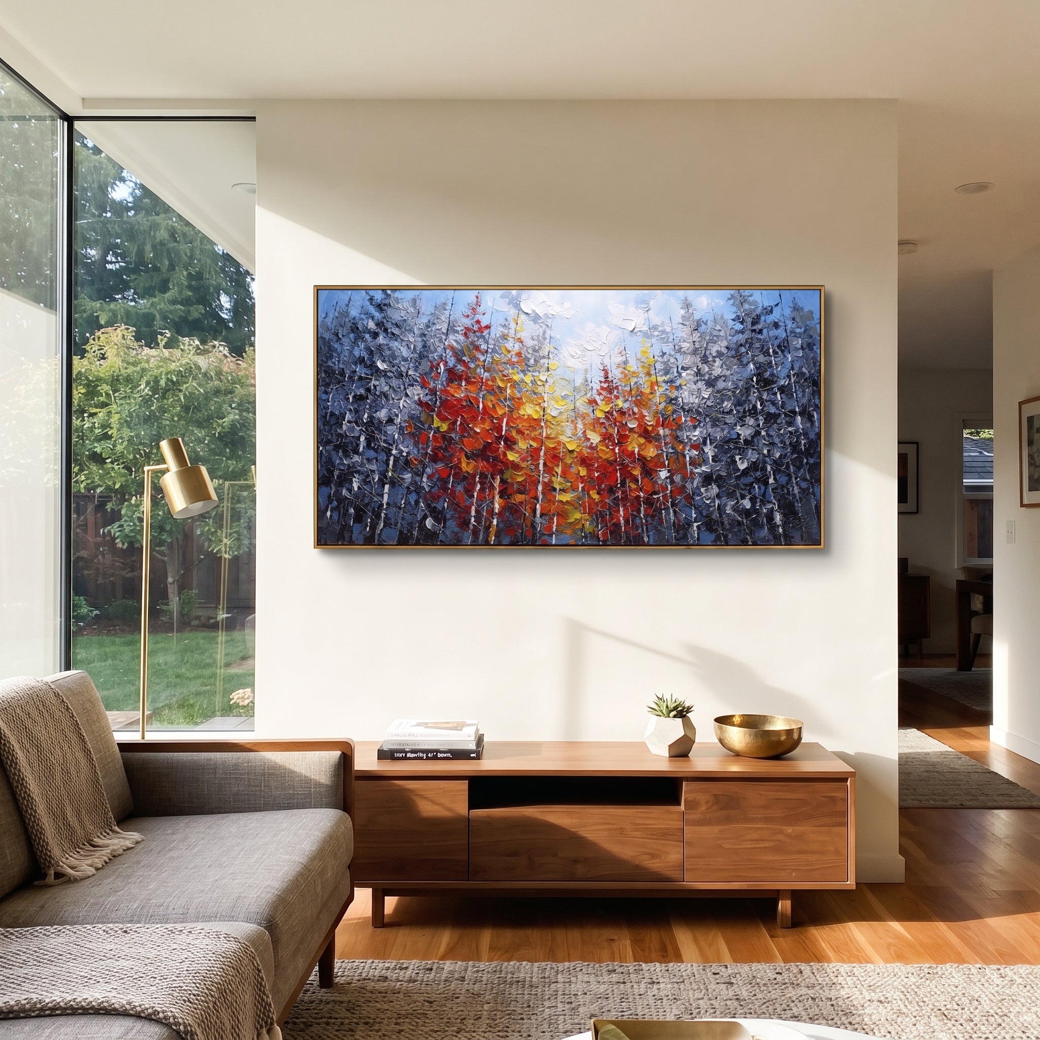 "Crimson Birch Canopy Painting" focuses on atmosphere, surface movement, and sculptural heavy impasto craftsmanship rather than a fixed literal storyline. The composition uses this hand-painted panoramic canvas presents dense cool grey birch woods with a wide crimson, orange, and yellow canopy spreading across the middle in thick sculptural strokes as the visual anchor, while layered palette-knife paint, raised plaster-like texture, and softened brush movement create tactile depth across the