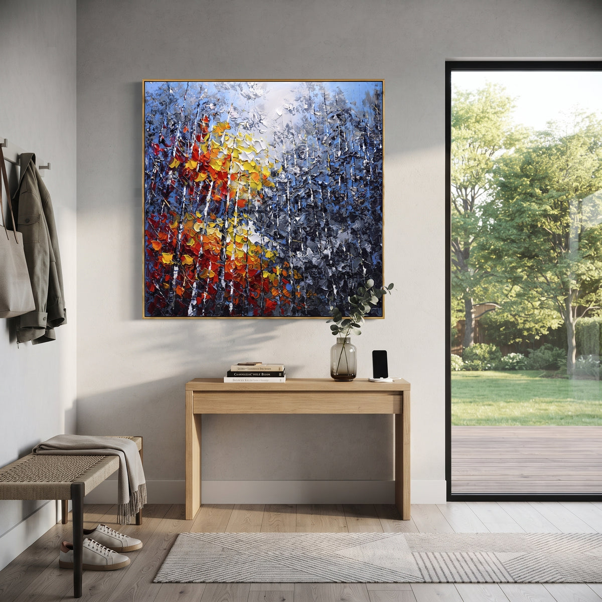 "Blue Grey Autumn Birch Painting" focuses on atmosphere, surface movement, and sculptural heavy impasto craftsmanship rather than a fixed literal storyline. The composition uses this hand-painted square canvas presents layered blue grey woodland, slender white birches, and a close foreground burst of red, orange, yellow, and white leaves in thick impasto texture as the visual anchor, while layered palette-knife paint, raised plaster-like texture, and softened brush movement create tactile depth