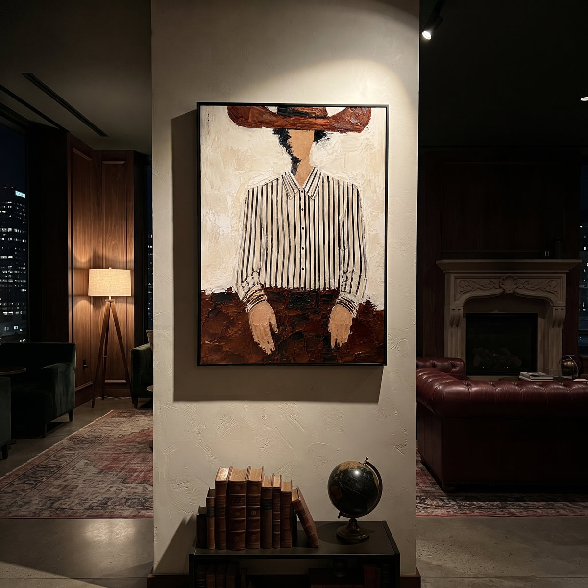 "Brown Hat Striped Torso Painting" focuses on atmosphere, surface movement, and sculptural heavy impasto craftsmanship rather than a fixed literal storyline. The composition uses this hand-painted vertical canvas crops a faceless figure beneath a wide brown hat, emphasizing the white striped shirt, dark belt, and rough brown lower texture as the visual anchor, while layered palette-knife paint, raised plaster-like texture, and softened brush movement create tactile depth across the canvas.