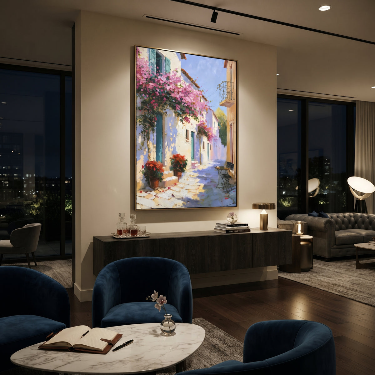 "Sunlit White Village Painting" focuses on atmosphere, surface movement, and sculptural heavy impasto craftsmanship rather than a fixed literal storyline. The composition uses this hand-painted Mediterranean canvas features white Mediterranean alley, terracotta roofs, potted flowers, distant sea and mountain light, built with raised palette-knife texture, layered brushwork, and luminous coastal color as the visual anchor, while layered palette-knife paint, raised plaster-like texture, and