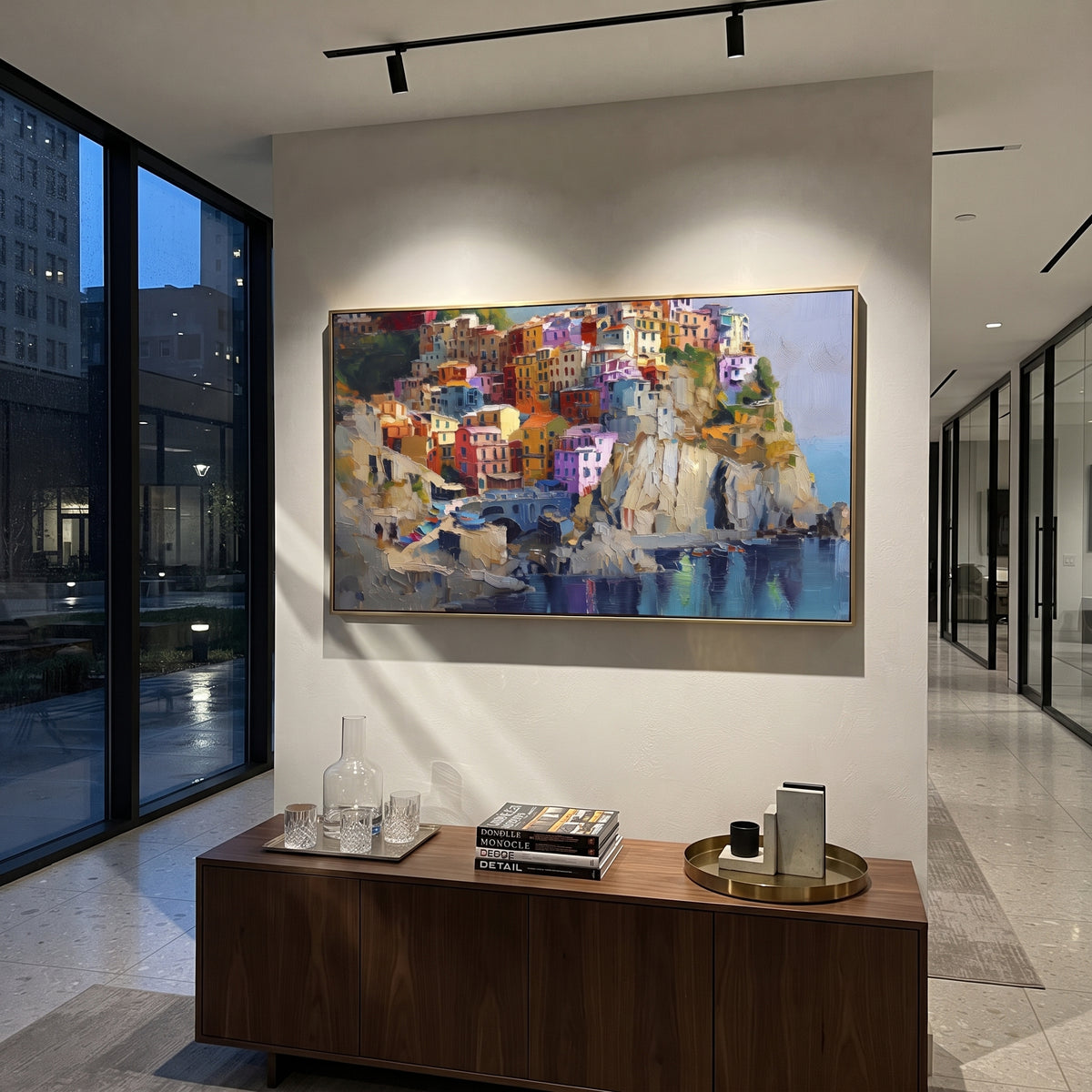 "Pastel Houses Cliff Painting" focuses on atmosphere, surface movement, and sculptural heavy impasto craftsmanship rather than a fixed literal storyline. The composition uses this hand-painted Mediterranean canvas features stacked pastel buildings on seaside cliffs, boats below, bright impasto coastal color, built with raised palette-knife texture, layered brushwork, and luminous coastal color as the visual anchor, while layered palette-knife paint, raised plaster-like texture, and softened