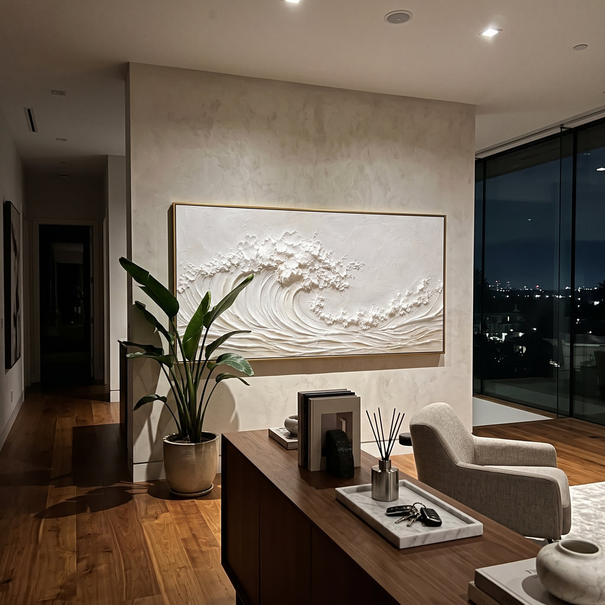 White Rolling Wave Relief focuses on this hand-painted panoramic textured canvas features an all-white curling ocean wave with raised foam, combed surf lines, and minimalist plaster texture across a calm neutral surface. The title and description are matched to the actual main image, so the visible subject, color balance, spacing, and surface movement stay specific to this product instead of using a repeated batch phrase. Raised palette-knife layers, sculpted impasto ridges, softened brush