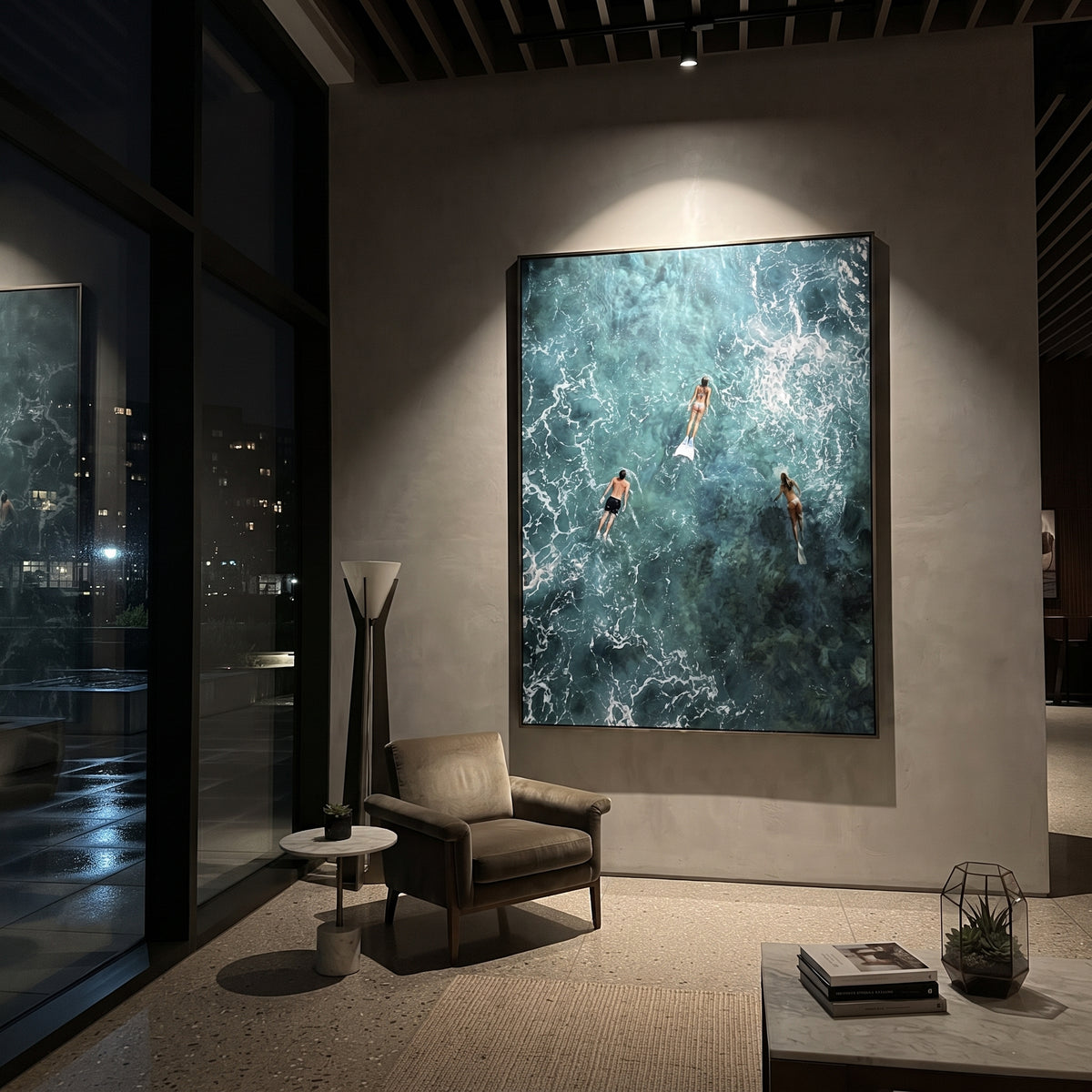 Aerial Blue Swimmers Seascape focuses on this hand-painted textured canvas features aerial turquoise ocean water, white foam tracery, three swimmers with fins, and deep teal underwater movement. The composition is described from the actual main image, so the visible subject, color balance, spacing, and surface movement stay specific to this product instead of reading like a batch title. Raised palette-knife layers, sculpted impasto ridges, softened brush transitions, and tactile handmade texture