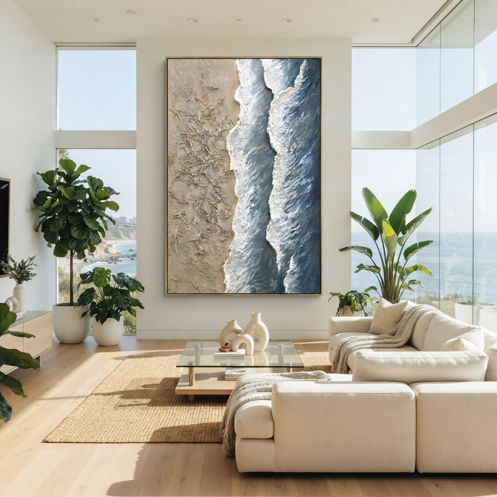 Aerial Blue Shore Relief focuses on this hand-painted textured canvas features a vertical aerial shoreline with textured beige sand, blue water bands, and raised white foam ridges. The composition is described from the actual main image, so the visible subject, color balance, spacing, and surface movement stay specific to this product instead of reading like a batch title. Raised palette-knife layers, sculpted impasto ridges, softened brush transitions, and tactile handmade texture give the