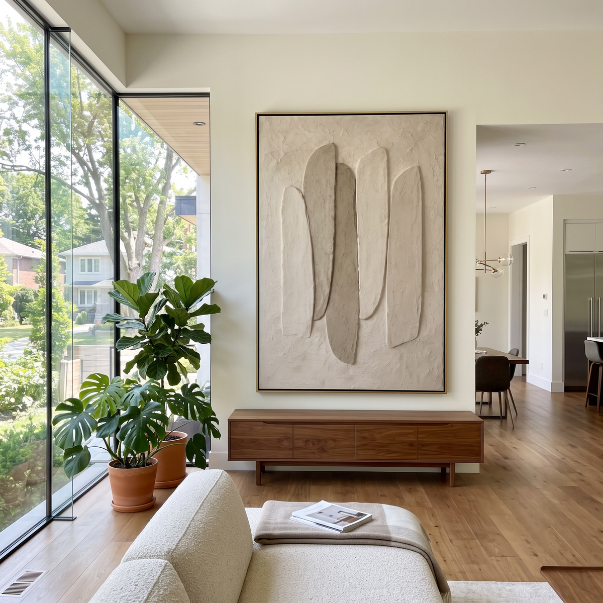 White Stacked Stone Relief focuses on this hand-painted textured canvas features stacked rounded white stone-like forms floating over a quiet textured plaster ground. The composition is described from the actual main image, so the visible subject, color balance, spacing, and surface movement stay specific to this product instead of reading like a batch title. Raised palette-knife layers, sculpted impasto ridges, softened brush transitions, and tactile handmade texture give the canvas dimensional