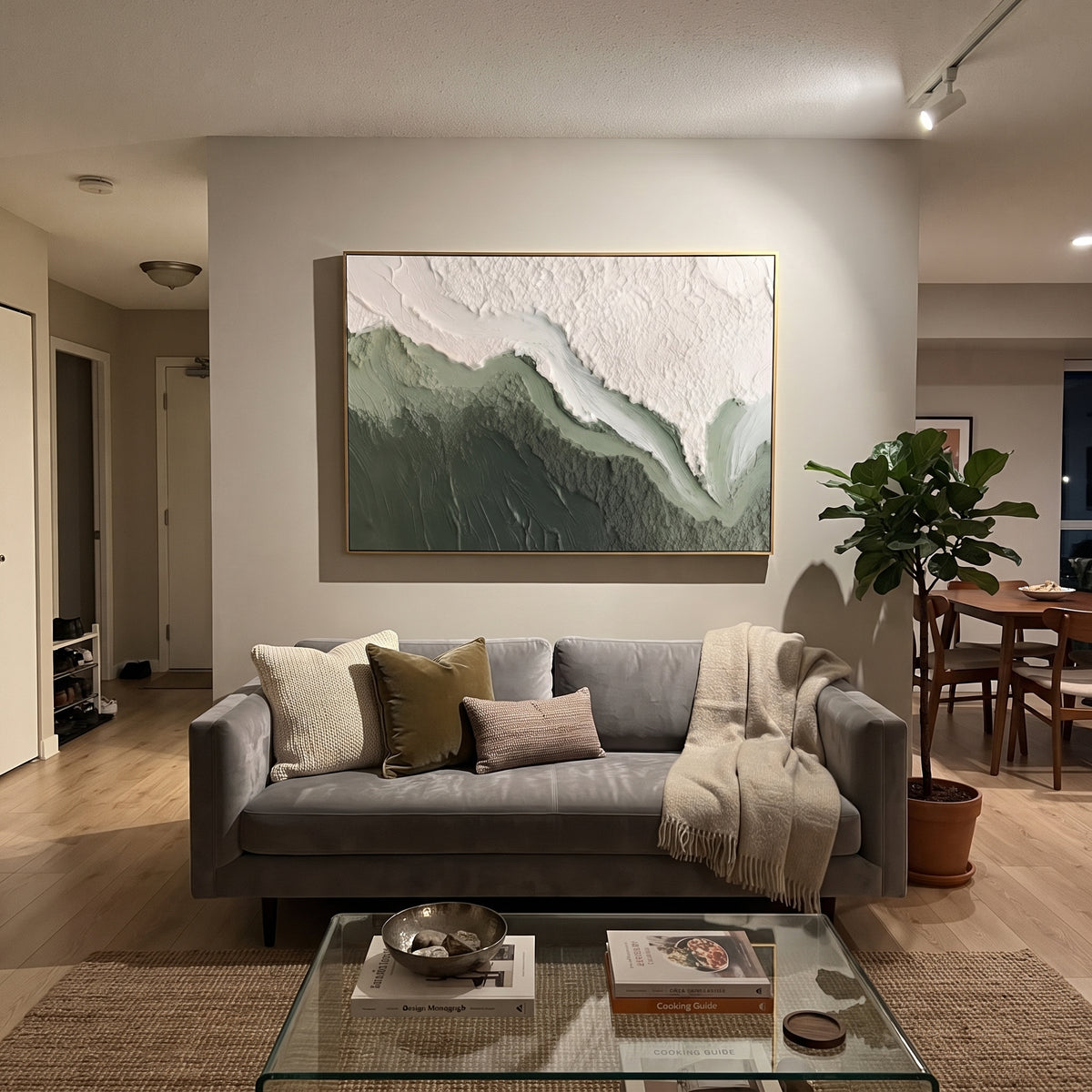 Green White Mountain Wave Relief focuses on this hand-painted textured canvas features layered water movement, raised seafoam ridges, shoreline texture, and coastal color depth. The composition is described from the actual main image, so the visible subject, color balance, spacing, and surface movement stay specific to this product instead of reading like a batch title. Raised palette-knife layers, sculpted impasto ridges, softened brush transitions, and tactile handmade texture give the canvas
