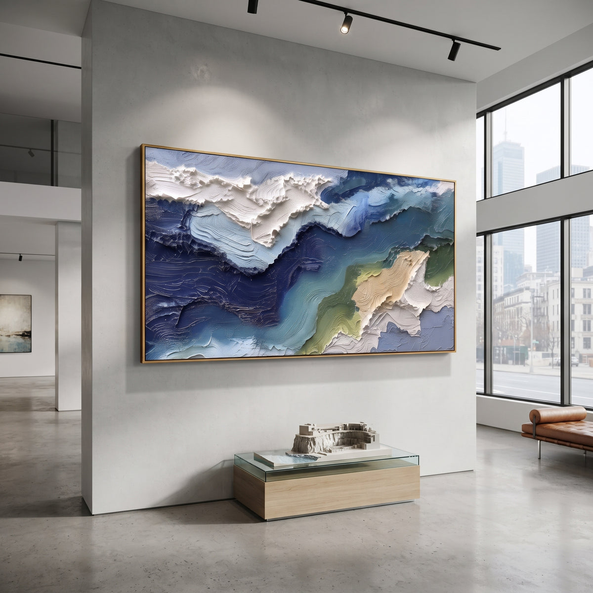 Blue Green Coastal Relief focuses on this hand-painted textured canvas features blue green coastal relief with white foamy edge, navy water, and beige shore forms. The composition is described from the actual main image, so the visible subject, color balance, spacing, and surface movement stay specific to this product instead of reading like a batch title. Raised palette-knife layers, sculpted impasto ridges, softened brush transitions, and tactile handmade texture give the canvas dimensional