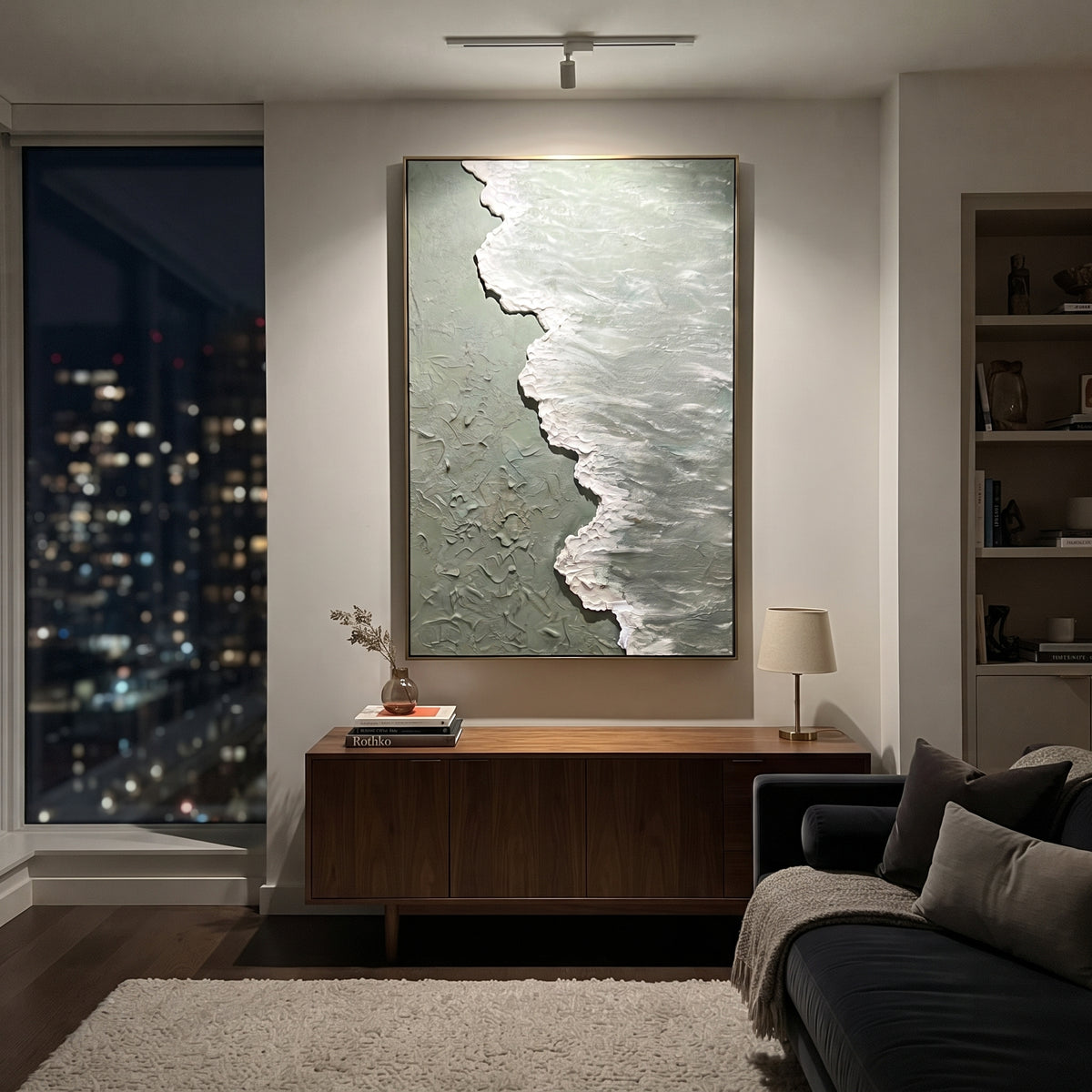 Sage Shoreline Wave Relief focuses on sage water meeting a foamy white shoreline in raised coastal texture, using the sage green family as the main atmosphere while keeping the subject and composition specific to the actual main image. The visible details are described from the artwork itself: the placement of the main forms, the surrounding negative space, the relationship between pale highlights and deeper green or dark accents, and the direction of the brushwork across the surface. Raised