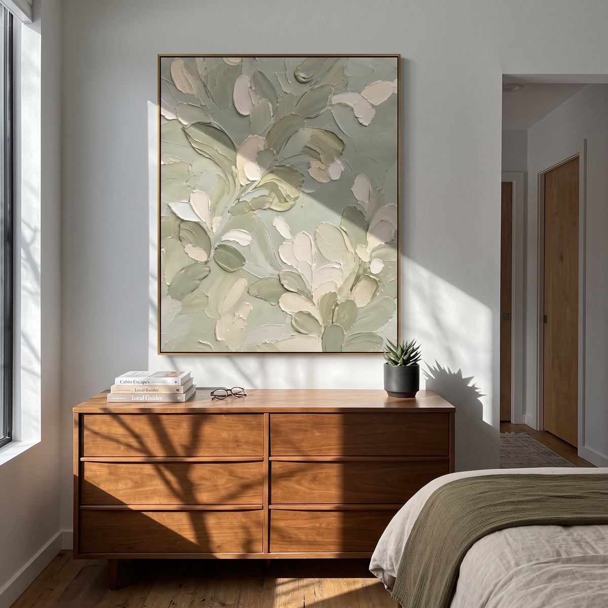 White Leaf Sage Botanical focuses on white leaves and pale blossoms layered over soft sage botanical brushwork, using the sage green family as the main atmosphere while keeping the subject and composition specific to the actual main image. The visible details are described from the artwork itself: the placement of the main forms, the surrounding negative space, the relationship between pale highlights and deeper green or dark accents, and the direction of the brushwork across the surface. Raised