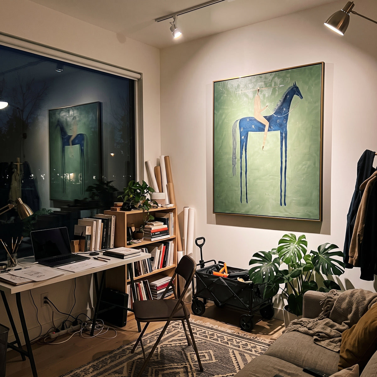 Blue Horse Sage Rider focuses on a blue horse with a small rider standing over a muted sage green ground, using the sage green family as the main atmosphere while keeping the subject and composition specific to the actual main image. The visible details are described from the artwork itself: the placement of the main forms, the surrounding negative space, the relationship between pale highlights and deeper green or dark accents, and the direction of the brushwork across the surface. Raised