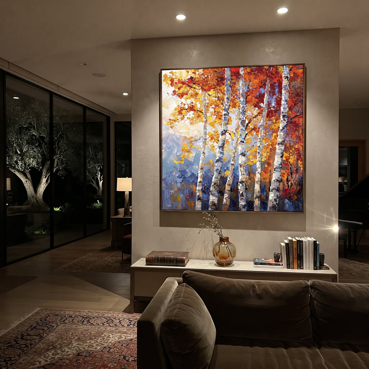 ARTWORK DETAILS Mountain Birch Flame Painting is built from the actual artwork image: upright birch trunks with fiery red gold leaves and mountain blue. The composition uses raised texture to separate tree trunks, leaf masses, ground movement, and soft background atmosphere, so the surface reads with real hand-painted depth from different viewing angles. The color direction is red, yellow, blue, chosen to keep the autumn mood warm while still leaving enough pale air and cool contrast for modern