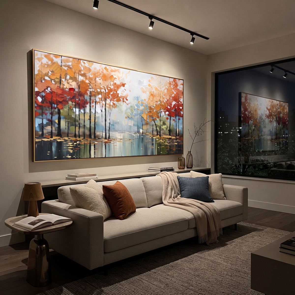 ARTWORK DETAILS Autumn Lake Tree Row Painting is built from the actual artwork image: warm tree row reflected across a calm autumn lake. The composition uses raised texture to separate tree trunks, leaf masses, ground movement, and soft background atmosphere, so the surface reads with real hand-painted depth from different viewing angles. The color direction is orange, blue, green, chosen to keep the autumn mood warm while still leaving enough pale air and cool contrast for modern interiors.