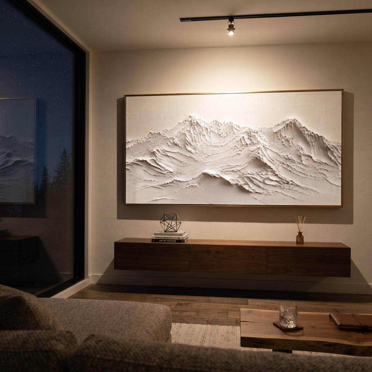 Long White Ridge Relief is written from the actual artwork image, focusing on long white ridge relief with fine carved lines and a low continuous mountain chain. The visible composition is specific rather than generic: fine carved ridgelines, a low continuous mountain chain, and restrained white relief texture. The wide horizontal layout controls how the eye travels through the scene, with the mountain mass, valley floor, tree line, water edge, or small figure details arranged to create depth