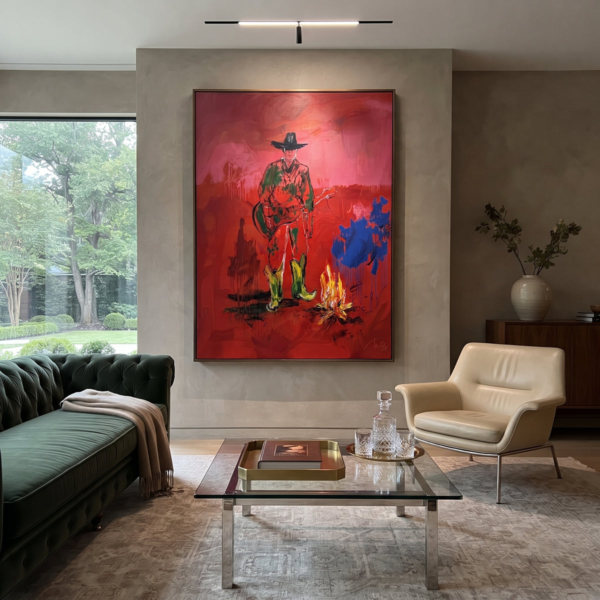 Red Firelight Cowboy is written from the actual artwork image, focusing on a lone cowboy standing near a small fire on a red night ground. The composition is built from specific visible details: lone figure, small campfire glow, red field, green clothing, and blue accent patch. The vertical composition keeps attention on lone figure, small campfire glow, red field, green clothing, and blue accent patch, using open ground, cropped edges, and strong color blocks to make the scene feel direct and
