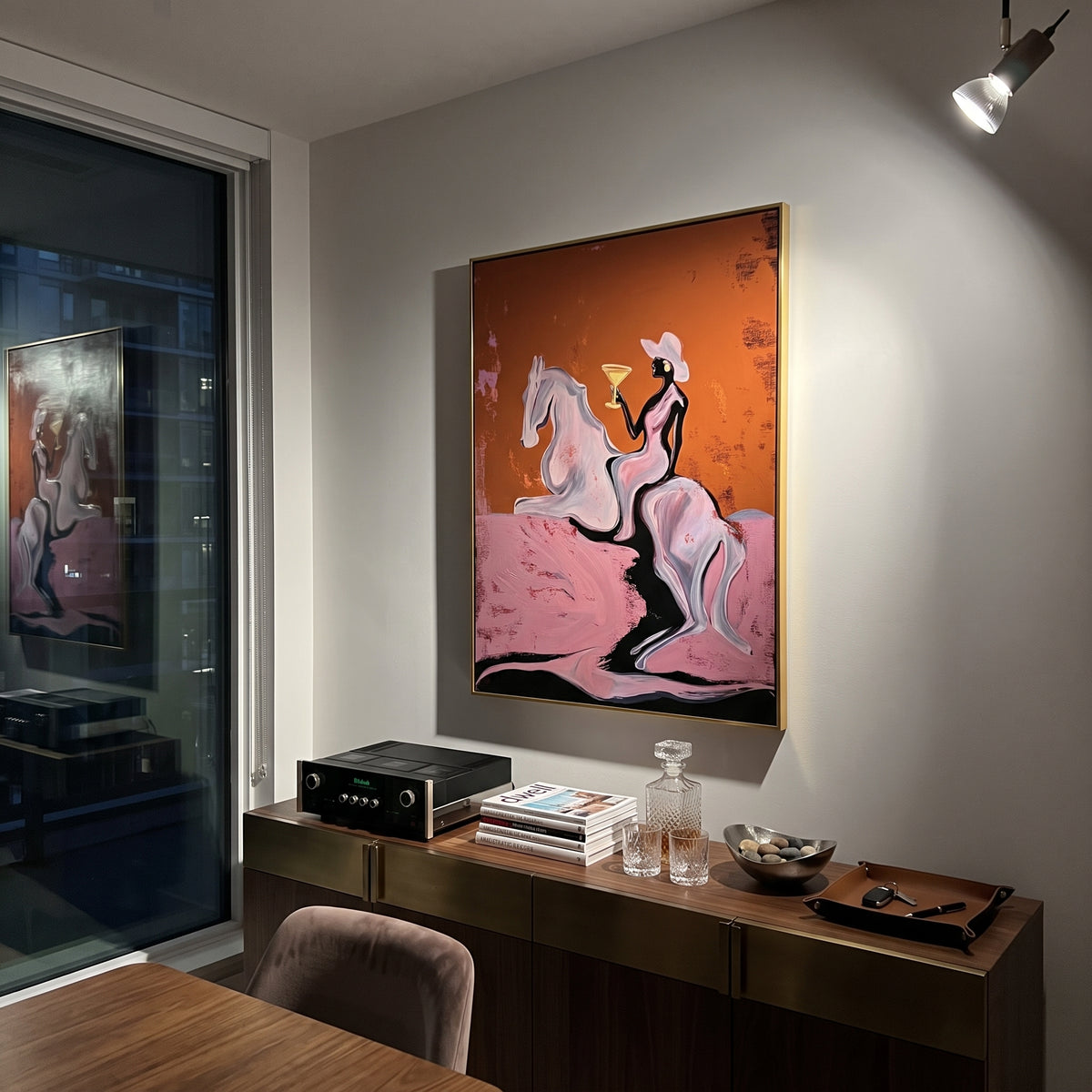 Martini Horse Ride is written from the actual artwork image, focusing on a cowgirl riding a white horse while holding a martini on an ochre field. The composition is built from specific visible details: white horse, raised martini, white hat, dark rider, ochre sky, and pink ground. The vertical composition keeps attention on white horse, raised martini, white hat, dark rider, ochre sky, and pink ground, using open ground, cropped edges, and strong color blocks to make the scene feel direct and