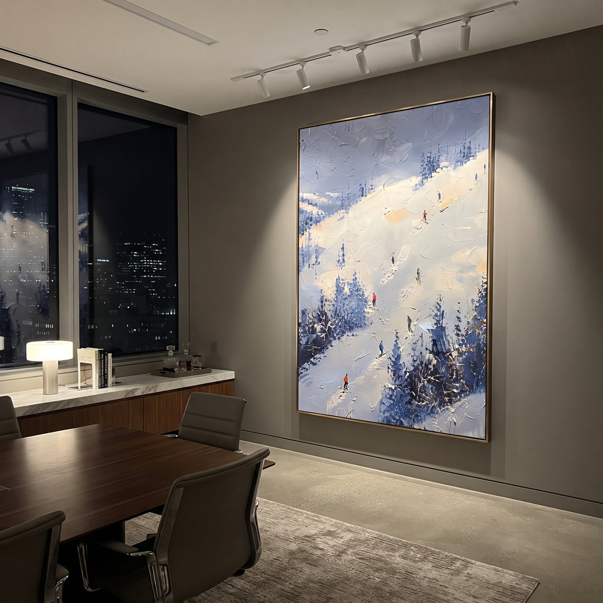 Carved Snow Trail focuses on soft gray snowfields broken by colorful skiers and thick ridge texture. The artwork shows a winter ski scene built from the actual image: visible downhill figures, curved snow tracks, raised ridgelines, and alpine space arranged in a tall composition. The white, gray, blue palette gives the piece a cold mountain atmosphere while the thick impasto surface creates shadows along each snowbank, ski line, and textured ridge. This is presented as hand-painted textured