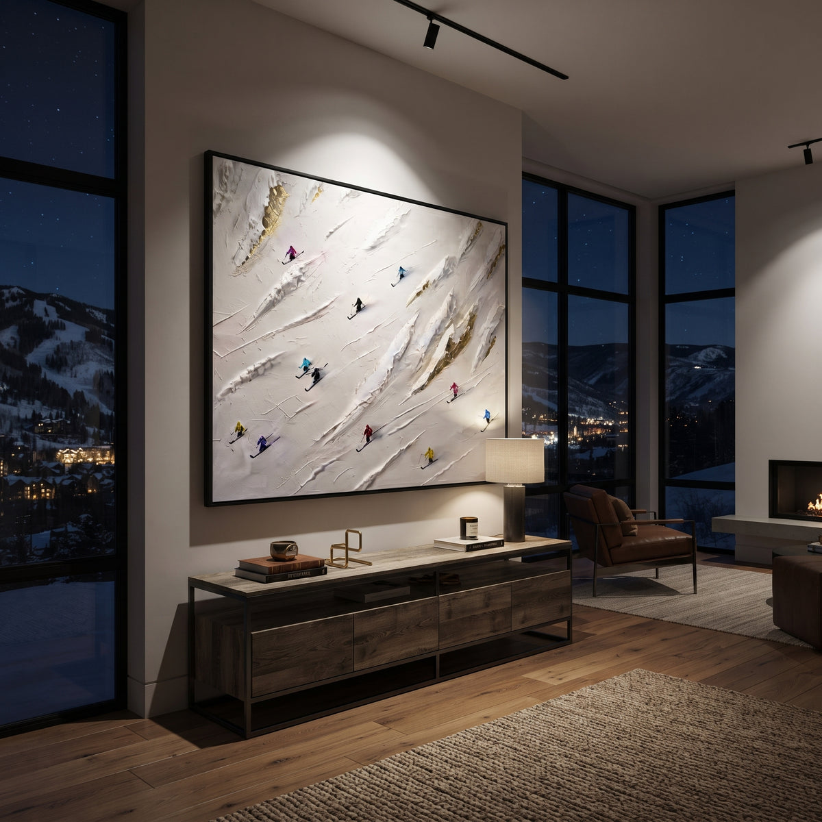 Misty Ski Valley focuses on soft gray snowfields broken by colorful skiers and thick ridge texture. The artwork shows a winter ski scene built from the actual image: visible downhill figures, curved snow tracks, raised ridgelines, and alpine space arranged in a wide composition. The white, black, gray palette gives the piece a cold mountain atmosphere while the thick impasto surface creates shadows along each snowbank, ski line, and textured ridge. This is presented as hand-painted textured