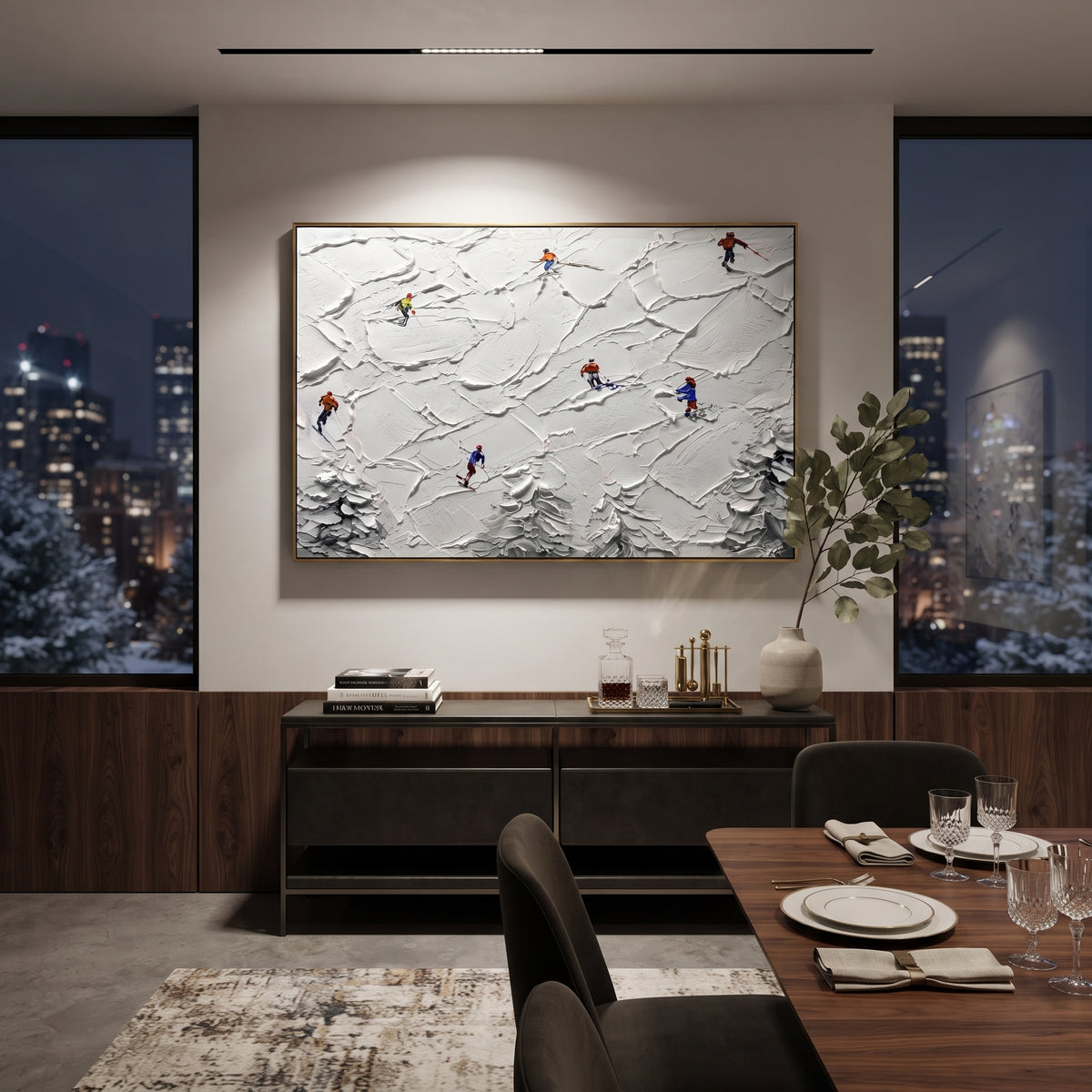 Peak Snow Basin focuses on layered snow ridges, visible ski marks, and a quiet pine border. The artwork shows a winter ski scene built from the actual image: visible downhill figures, curved snow tracks, raised ridgelines, and alpine space arranged in a wide composition. The white, gray, blue palette gives the piece a cold mountain atmosphere while the thick impasto surface creates shadows along each snowbank, ski line, and textured ridge. This is presented as hand-painted textured canvas rather