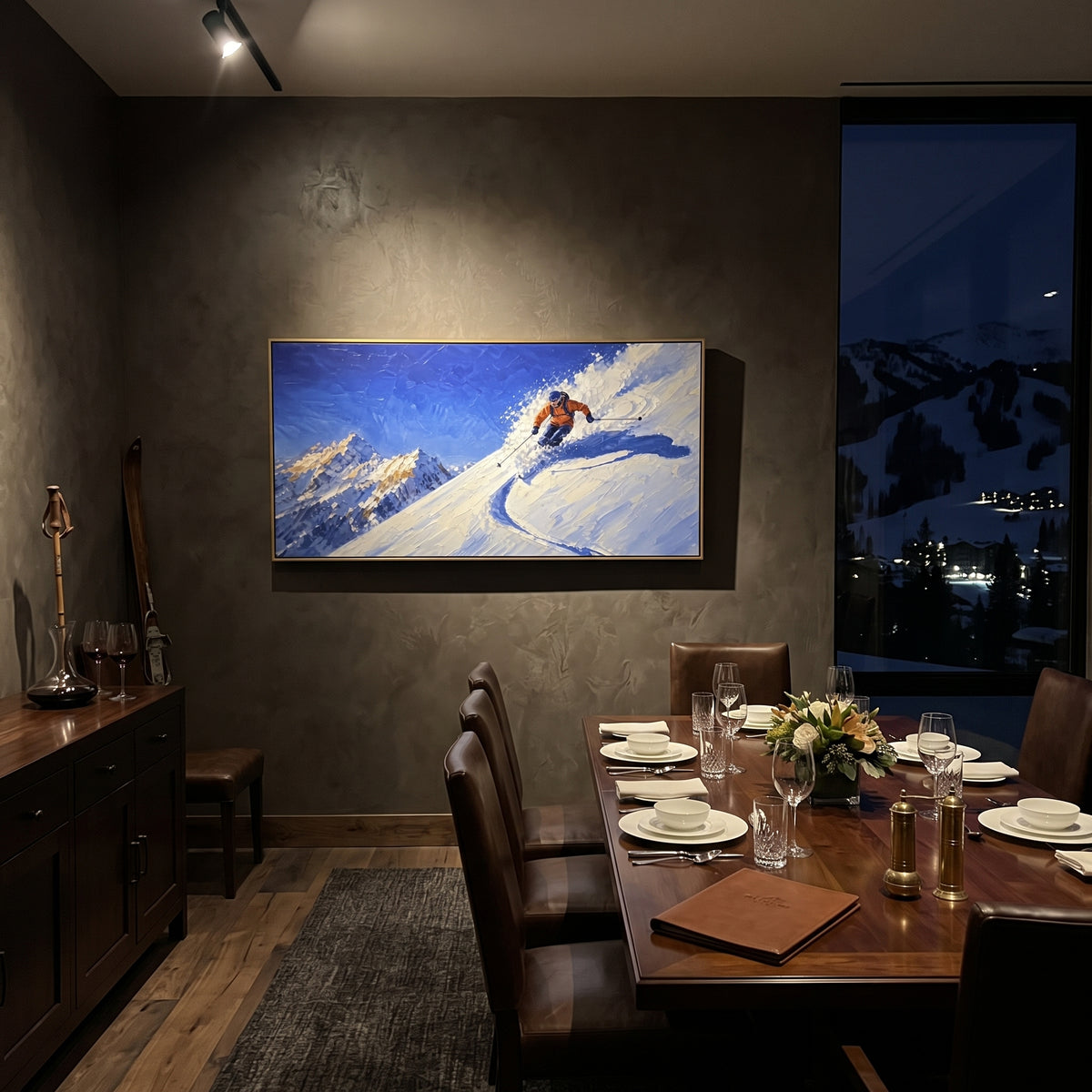 Orange Powder Turn Skier focuses on a single orange skier carving a blue shadowed turn across a ridge. The artwork shows a winter ski scene built from the actual image: visible downhill figures, curved snow tracks, raised ridgelines, and alpine space arranged in a wide composition. The blue, orange, white palette gives the piece a cold mountain atmosphere while the thick impasto surface creates shadows along each snowbank, ski line, and textured ridge. This is presented as hand-painted textured