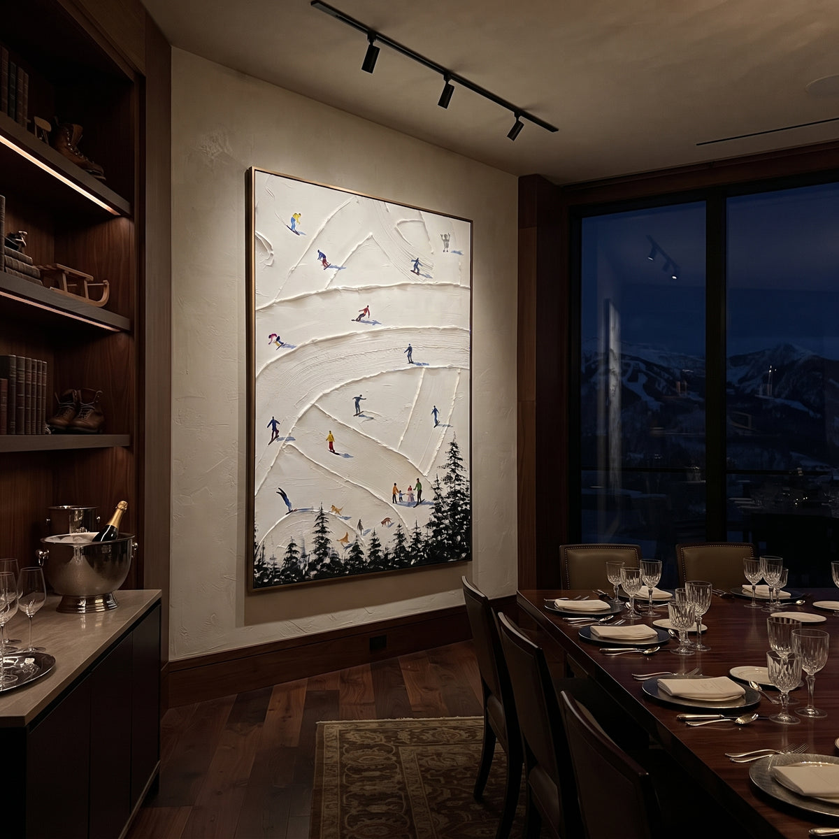 North Ski Valley focuses on a high alpine trail where tiny figures pass between textured snowbanks. The artwork shows a winter ski scene built from the actual image: visible downhill figures, curved snow tracks, raised ridgelines, and alpine space arranged in a tall composition. The white, black, gray palette gives the piece a cold mountain atmosphere while the thick impasto surface creates shadows along each snowbank, ski line, and textured ridge. This is presented as hand-painted textured