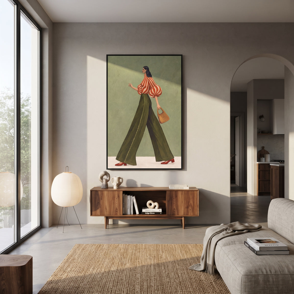Red Stripe Handbag Walk focuses on the specific fashion figure shown in the artwork: walking woman with red striped puff blouse, olive trousers, and tan handbag. The image is built around elongated trousers, a compact upper-body pose, sculptural sleeve volume, small accessory detail, and a quiet studio background. The green, red, beige palette keeps the mood refined while the raised texture and visible brushwork make the surface feel handmade rather than printed. This made-to-order canvas suits