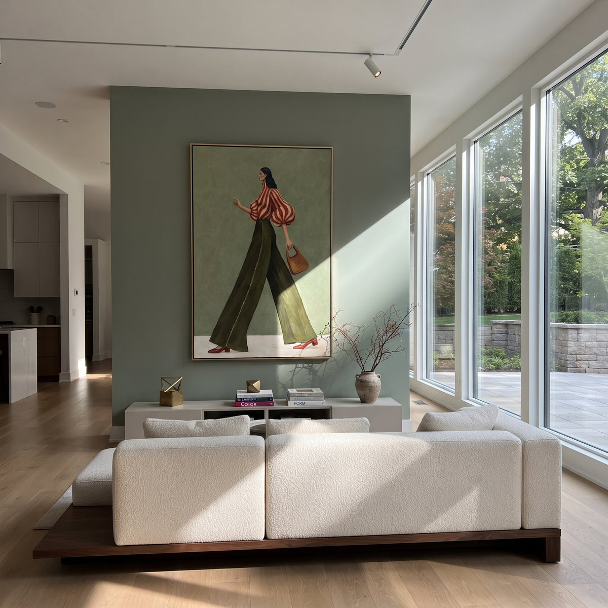 Red Stripe Handbag Walk focuses on the specific fashion figure shown in the artwork: walking woman with red striped puff blouse, olive trousers, and tan handbag. The image is built around elongated trousers, a compact upper-body pose, sculptural sleeve volume, small accessory detail, and a quiet studio background. The green, red, beige palette keeps the mood refined while the raised texture and visible brushwork make the surface feel handmade rather than printed. This made-to-order canvas suits