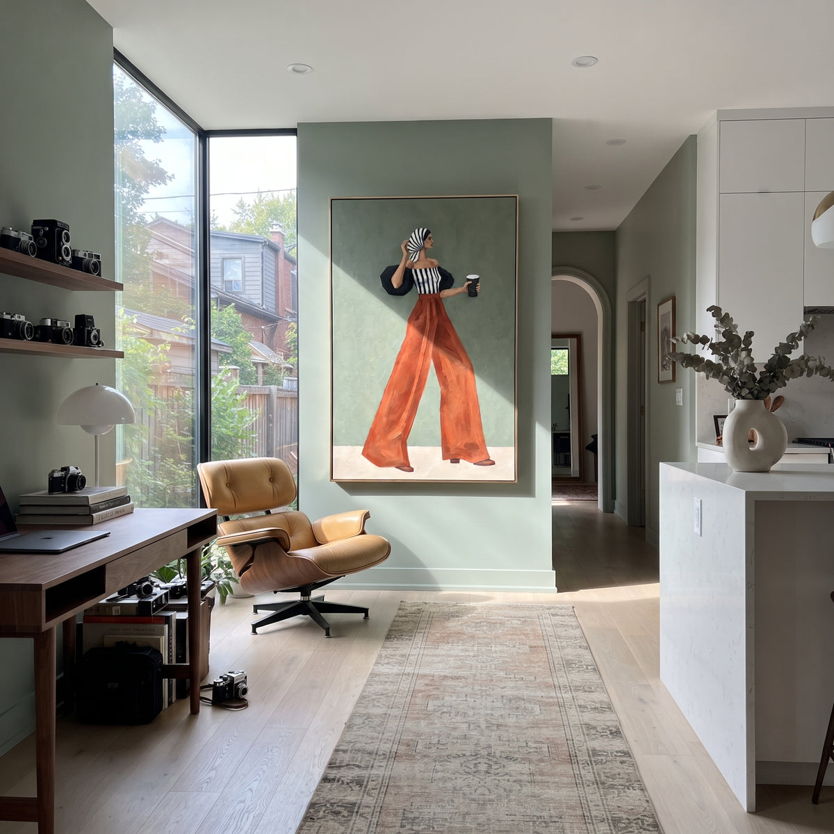 Striped Bandeau Coffee Walk focuses on the specific fashion figure shown in the artwork: woman in striped bandeau top and rust trousers with head scarf and coffee cup. The image is built around elongated trousers, a compact upper-body pose, sculptural sleeve volume, small accessory detail, and a quiet studio background. The brown, black, beige palette keeps the mood refined while the raised texture and visible brushwork make the surface feel handmade rather than printed. This made-to-order