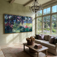 This 100% hand-painted floral abstract features this hand-painted horizontal canvas presents an impressionist garden scene with deep green foliage, pink blossoms, blue shadows, and sunlit meadow color. Layered brushwork, tactile surface detail, and a refined framed presentation create a distinctive statement for living rooms, bedrooms, offices, entries, and modern commercial interiors.