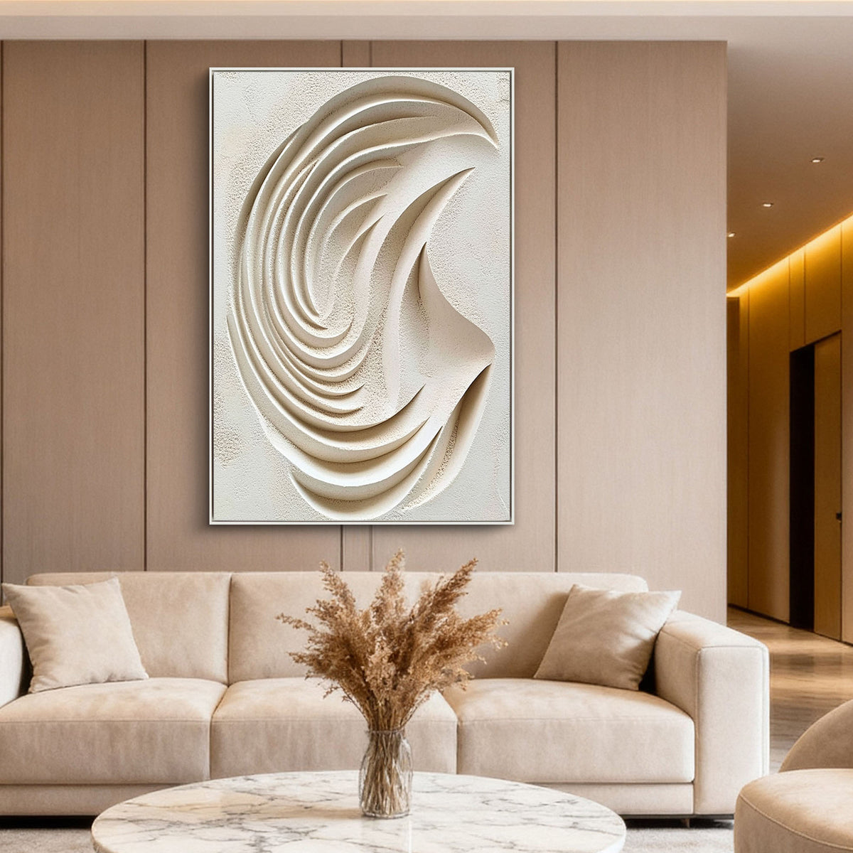 This hand-crafted 3D abstract wall art features an oval flowing relief form in soft off-white and beige tones. The raised plaster-style surface catches light naturally, creating depth and movement for living rooms, bedrooms, entryways, villas, hotels, and minimalist spaces.