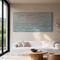 "Azure Textured Passage" is a 100% hand-painted abstract artwork created with professional oil and acrylic paints on high-quality canvas. Its blue & white palette and visible textured strokes give every piece authentic handmade variation and tactile depth.
