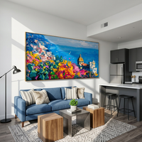 This 100% hand-painted coastal landscape combines an azure sea, hillside village, and vivid fuchsia garden texture. Thick palette-knife strokes give the artwork real surface depth and a sunlit, vacation-like mood for living rooms, dining rooms, hotels, and villa interiors.