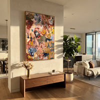 "Earthy Bohemian Collage Painting" focuses on atmosphere, surface movement, and sculptural heavy impasto craftsmanship rather than a fixed literal storyline. The composition uses this hand-painted vertical canvas presents an earthy bohemian abstract collage with terracotta, dusty pink, ochre, muted blue, olive green, cream marks, and dense palette-knife texture as the visual anchor, while layered palette-knife paint, raised plaster-like texture, and softened brush movement create tactile depth