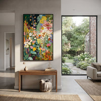 "Dark Green Bohemian Floral Painting" focuses on atmosphere, surface movement, and sculptural heavy impasto craftsmanship rather than a fixed literal storyline. The composition uses this hand-painted vertical canvas presents a lush bohemian floral garden with deep green background, white and cream blossoms, yellow flowers, pink petals, teal leaves, and sculptural palette-knife texture as the visual anchor, while layered palette-knife paint, raised plaster-like texture, and softened brush