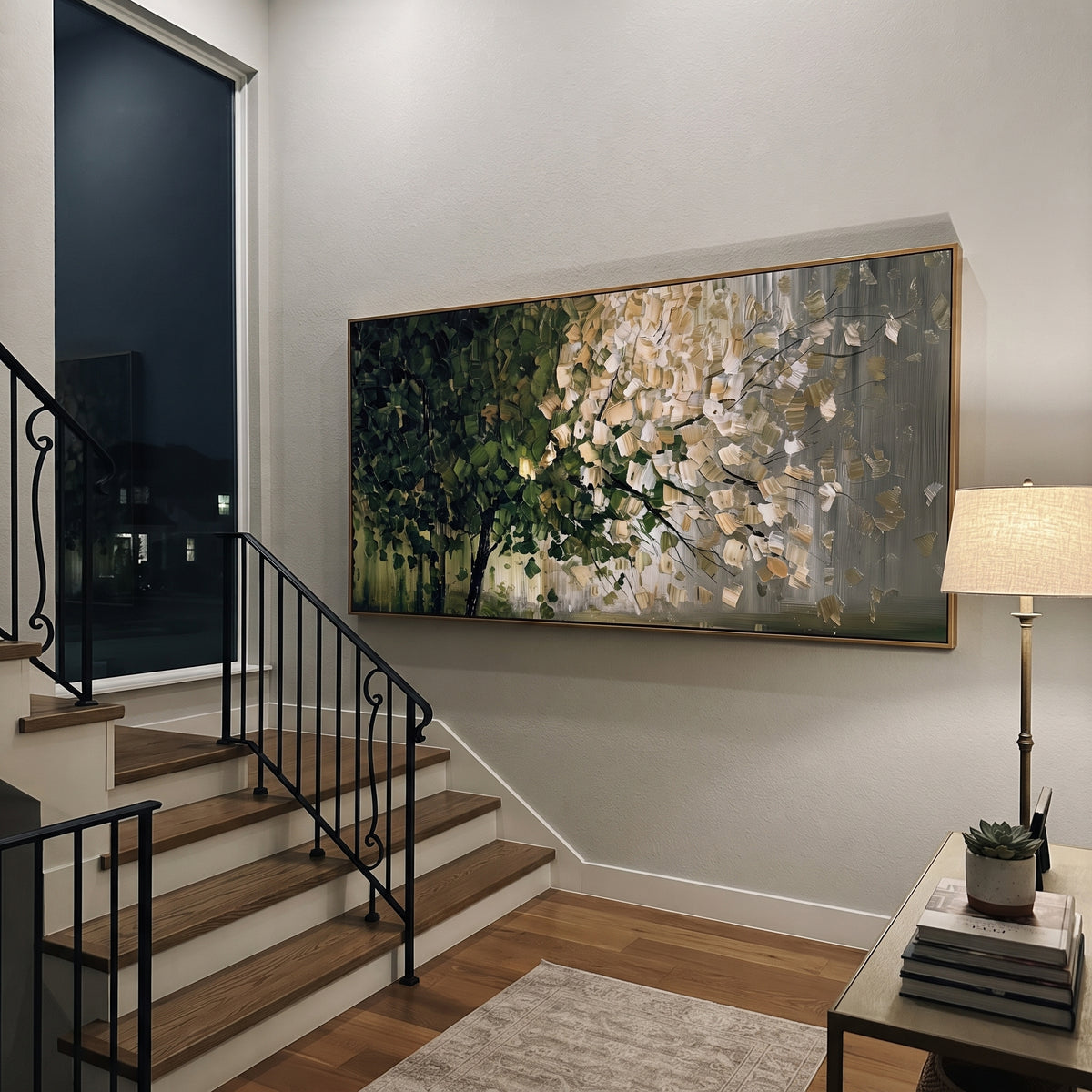 "Woodland Blossom Branch Painting" focuses on atmosphere, surface movement, and sculptural heavy impasto craftsmanship rather than a fixed literal storyline. The composition uses this hand-painted panoramic canvas features a woodland branch composition with dark green foliage, pale cream leaf clusters, fine black branch lines, a cool grey background, and tactile impasto strokes across the tree canopy as the visual anchor, while layered palette-knife paint, raised plaster-like texture, and