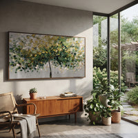 "Soft Green Canopy Tree Painting" focuses on atmosphere, surface movement, and sculptural heavy impasto craftsmanship rather than a fixed literal storyline. The composition uses this hand-painted panoramic canvas shows a graceful tree canopy spreading across a soft grey ground, with layered green, yellow, and white leaves, fine dark stems, and heavy palette-knife texture across the foliage as the visual anchor, while layered palette-knife paint, raised plaster-like texture, and softened brush