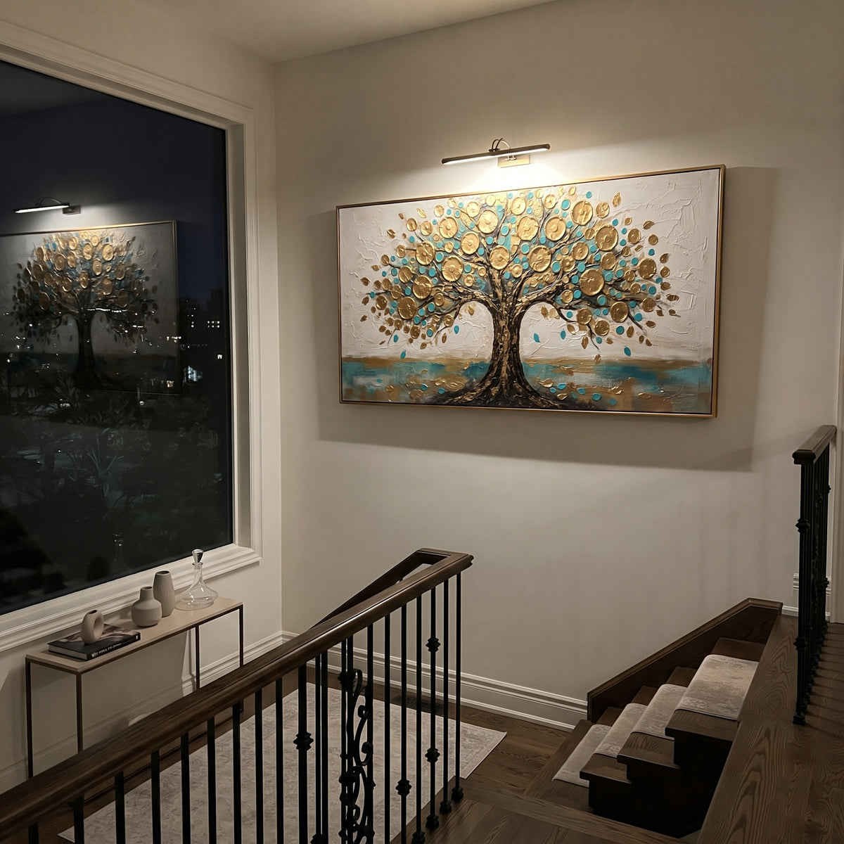 "Turquoise Gold Money Tree Painting" focuses on atmosphere, surface movement, and sculptural heavy impasto craftsmanship rather than a fixed literal storyline. The composition uses this hand-painted panoramic canvas presents a symbolic money tree with a textured dark trunk, raised metallic golden circles, turquoise accents, scattered gold leaves, and a white plaster-textured background as the visual anchor, while layered palette-knife paint, raised plaster-like texture, and softened brush