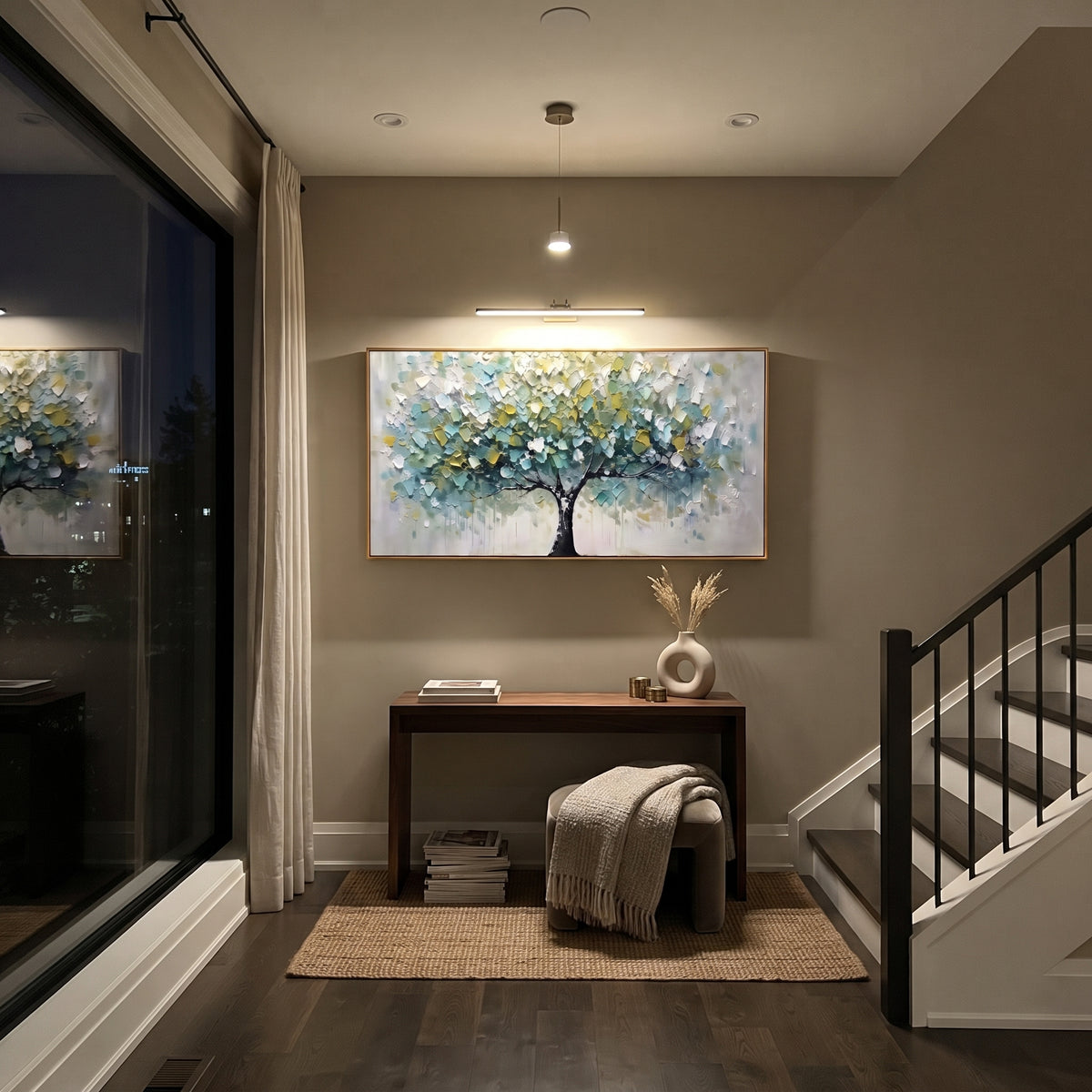 "Neutral Autumn Tree Painting" focuses on atmosphere, surface movement, and sculptural heavy impasto craftsmanship rather than a fixed literal storyline. The composition uses this hand-painted panoramic canvas shows a black-trunk tree with a wide canopy of muted sage, cream, white, and soft ochre leaves, set over a calm neutral background with heavy impasto texture as the visual anchor, while layered palette-knife paint, raised plaster-like texture, and softened brush movement create tactile