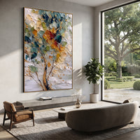 "Colorful Abstract Tree Painting" focuses on atmosphere, surface movement, and sculptural heavy impasto craftsmanship rather than a fixed literal storyline. The composition uses this hand-painted vertical canvas features a close-up abstract tree with layered teal, green, cream, golden, and red-orange leaves, dark branch lines, and a heavily textured palette-knife surface as the visual anchor, while layered palette-knife paint, raised plaster-like texture, and softened brush movement create