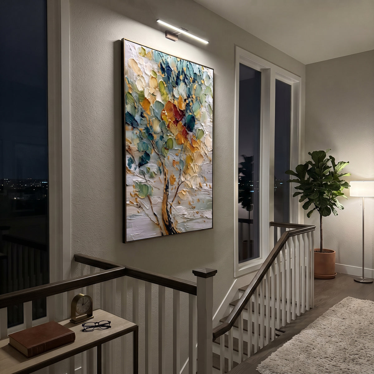 "Colorful Abstract Tree Painting" focuses on atmosphere, surface movement, and sculptural heavy impasto craftsmanship rather than a fixed literal storyline. The composition uses this hand-painted vertical canvas features a close-up abstract tree with layered teal, green, cream, golden, and red-orange leaves, dark branch lines, and a heavily textured palette-knife surface as the visual anchor, while layered palette-knife paint, raised plaster-like texture, and softened brush movement create
