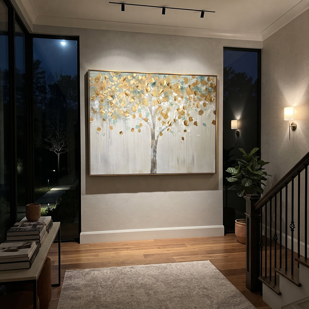 "Pale Gold Tree Painting" focuses on atmosphere, surface movement, and sculptural heavy impasto craftsmanship rather than a fixed literal storyline. The composition uses this hand-painted horizontal canvas presents a pale horizontal tree with scattered metallic golden leaves, a slim grey trunk, light blue-green haze, and soft white dripping texture, with visible raised palette-knife paint and handmade surface depth as the visual anchor, while layered palette-knife paint, raised plaster-like