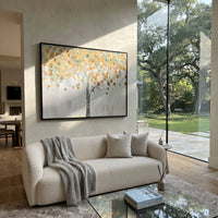 "Pale Gold Leaf Tree Painting" focuses on atmosphere, surface movement, and sculptural heavy impasto craftsmanship rather than a fixed literal storyline. The composition uses this hand-painted horizontal canvas presents a light horizontal tree scene with a soft grey trunk, scattered metallic golden leaves, pale blue-green shadows, and white dripping texture, with visible raised palette-knife paint and handmade surface depth as the visual anchor, while layered palette-knife paint, raised