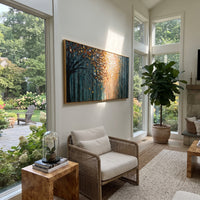 "Autumn Light Forest Painting" focuses on atmosphere, surface movement, and sculptural heavy impasto craftsmanship rather than a fixed literal storyline. The composition uses this hand-painted panoramic canvas presents a deep blue forest opening into warm orange and golden autumn light, with a dark foreground tree and visible raised palette-knife texture as the visual anchor, while layered palette-knife paint, raised plaster-like texture, and softened brush movement create tactile depth across