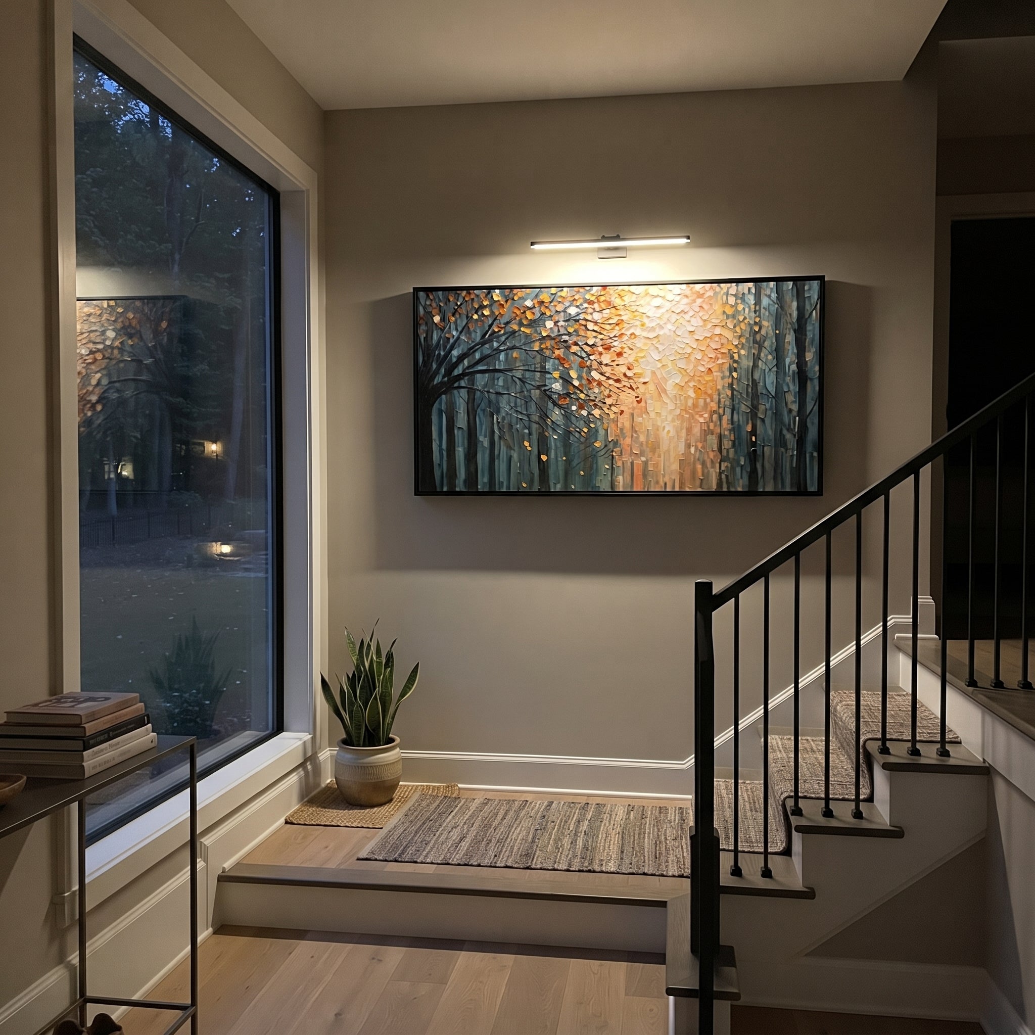 "Autumn Light Forest Painting" focuses on atmosphere, surface movement, and sculptural heavy impasto craftsmanship rather than a fixed literal storyline. The composition uses this hand-painted panoramic canvas presents a deep blue forest opening into warm orange and golden autumn light, with a dark foreground tree and visible raised palette-knife texture as the visual anchor, while layered palette-knife paint, raised plaster-like texture, and softened brush movement create tactile depth across
