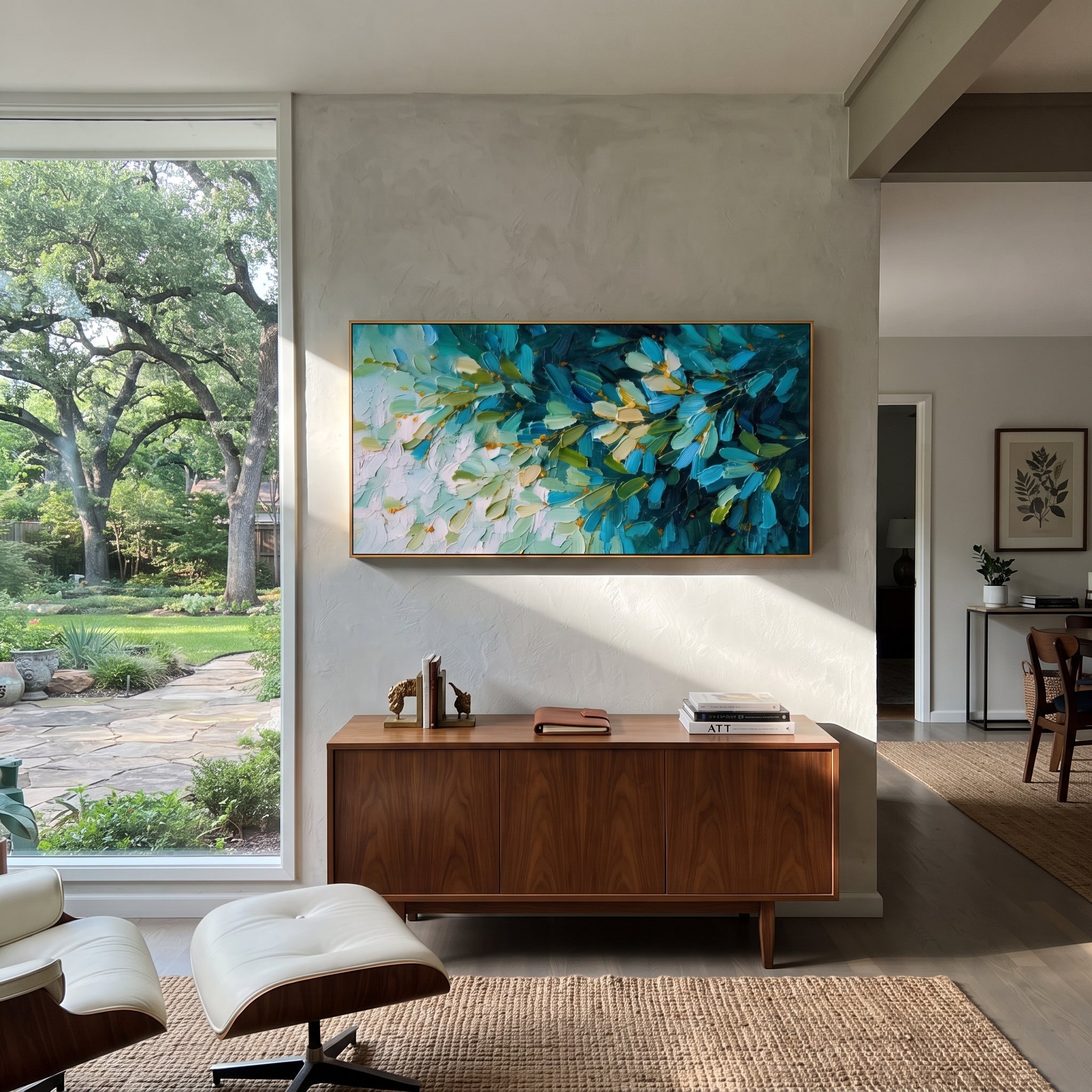 "Teal Green Leaf Branch Painting" focuses on atmosphere, surface movement, and sculptural heavy impasto craftsmanship rather than a fixed literal storyline. The composition uses this hand-painted panoramic canvas presents a close view of leafy branches in deep teal blue, green, cream white, and small golden accents, with visible raised palette-knife texture as the visual anchor, while layered palette-knife paint, raised plaster-like texture, and softened brush movement create tactile depth