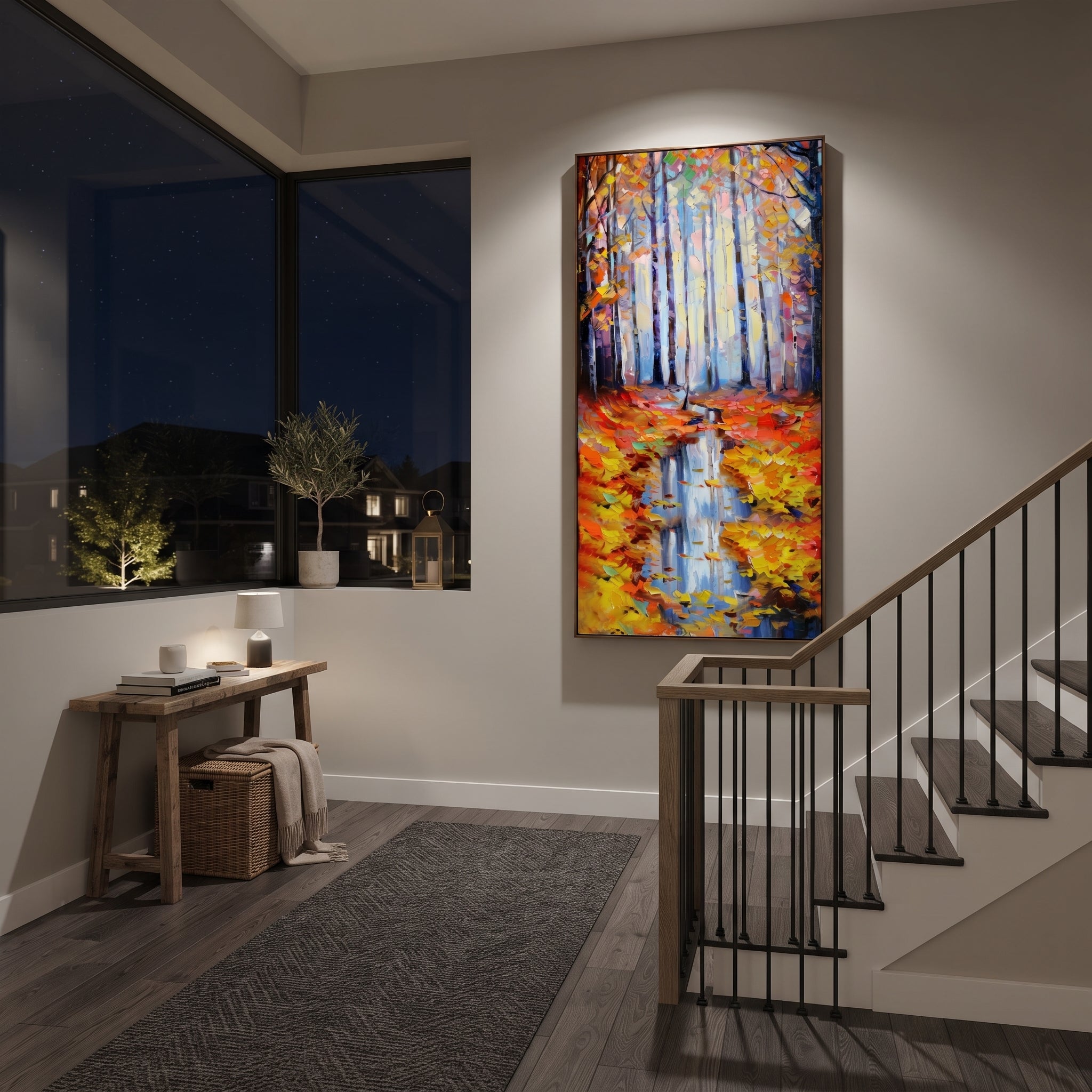 "Autumn Forest Reflection Painting" focuses on atmosphere, surface movement, and sculptural heavy impasto craftsmanship rather than a fixed literal storyline. The composition uses this hand-painted vertical canvas presents pale blue forest trunks above a narrow water reflection, framed by orange and yellow autumn leaves with thick palette-knife texture as the visual anchor, while layered palette-knife paint, raised plaster-like texture, and softened brush movement create tactile depth across the