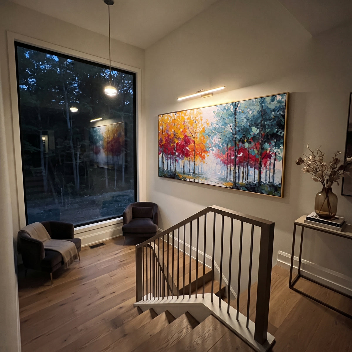 "Rainbow Tree Line Painting" focuses on atmosphere, surface movement, and sculptural heavy impasto craftsmanship rather than a fixed literal storyline. The composition uses this hand-painted panoramic canvas presents a panoramic row of slender trees with yellow orange and red foliage on the left, cool teal blue trees on the right, and a pale misty opening in the center as the visual anchor, while layered palette-knife paint, raised plaster-like texture, and softened brush movement create tactile