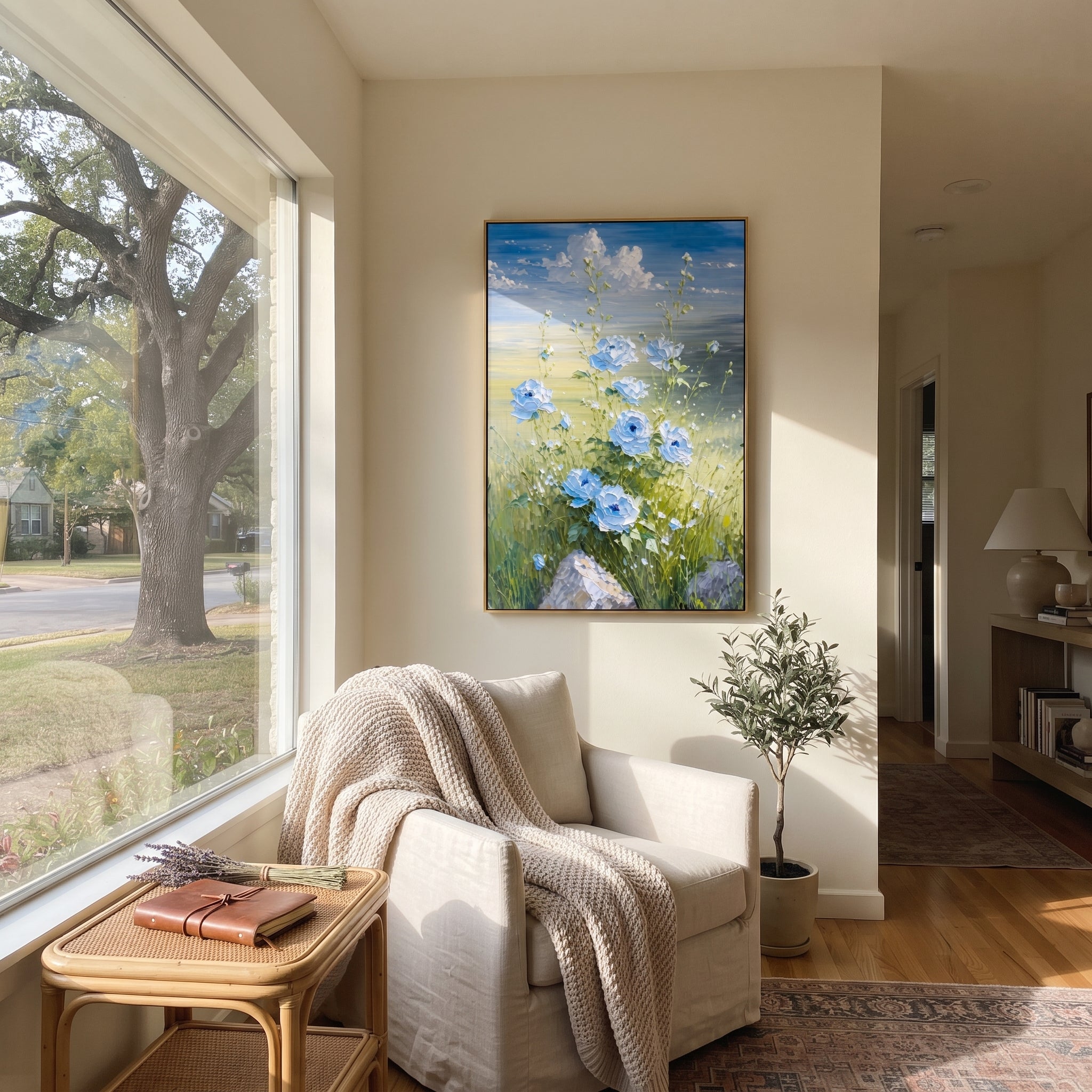 "Blue Meadow Flower Painting" focuses on atmosphere, surface movement, and sculptural heavy impasto craftsmanship rather than a fixed literal storyline. The composition uses this hand-painted vertical canvas presents blue and white flowers rising from green meadow grass beneath a soft blue sky, with raised petals and delicate stems as the visual anchor, while layered palette-knife paint, raised plaster-like texture, and softened brush movement create tactile depth across the canvas. Curated with